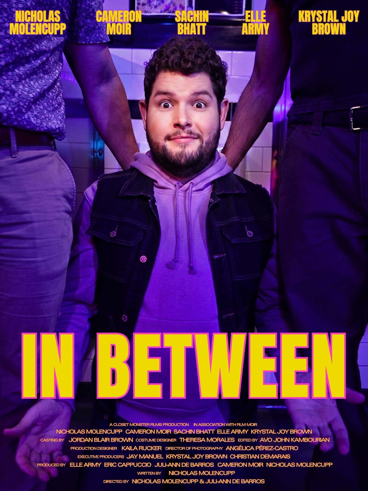 In Between — official movie poster. A queer romantic dramedy written and directed by Nicholas Molencupp, starring Cameron Moir, Sachin Bhatt, Elle Army, and Krystal Joy Brown.